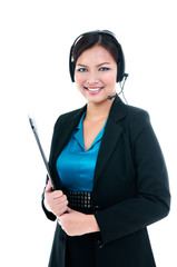 Happy customer service staff with headset and holding clipboard over white background.