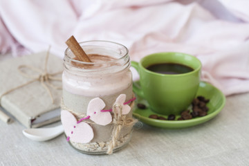 Romantic rich breakfast: oatmeal with berry yogurt and cinnamon,