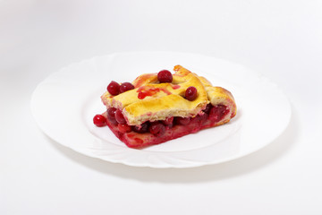 Delicious cherry pie on a white background.