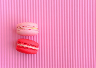 Red and pink macaroon on pink background