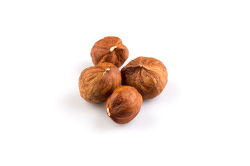 Hazelnuts on the white background
