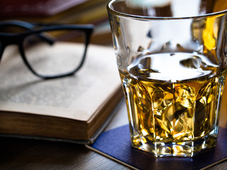 Whiskey on the rocks and scholar books