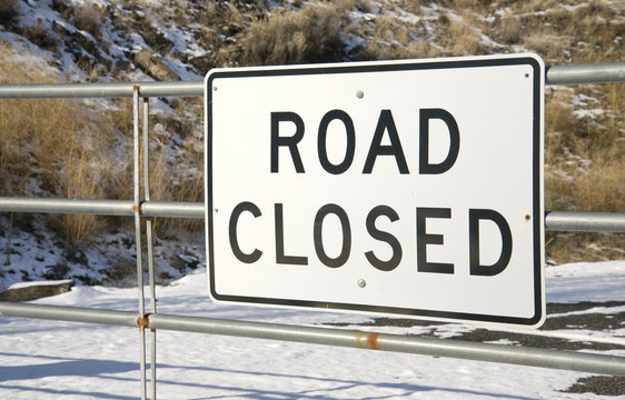 Road Closed Sign Rural Setting in Fresh Snow