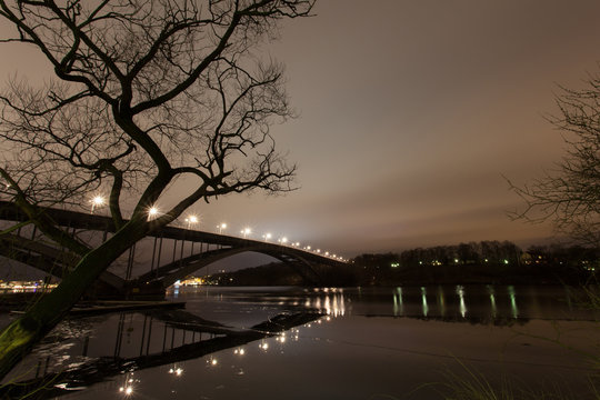Ice with a thin layer of water. The bridge "Vasterbron" in Stockholm, Sweden.