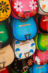 Colorful traditional mexican guitars on market. Great for background