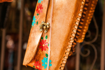 Hand made colorful leather little bags in Mexican market