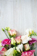 bouquet of beautiful flowers on wooden surface
