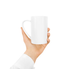 White blank mug mock up holding hand isolated on white. 