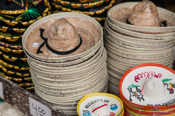 Colorful sombreros for sale at a market in Mexico.