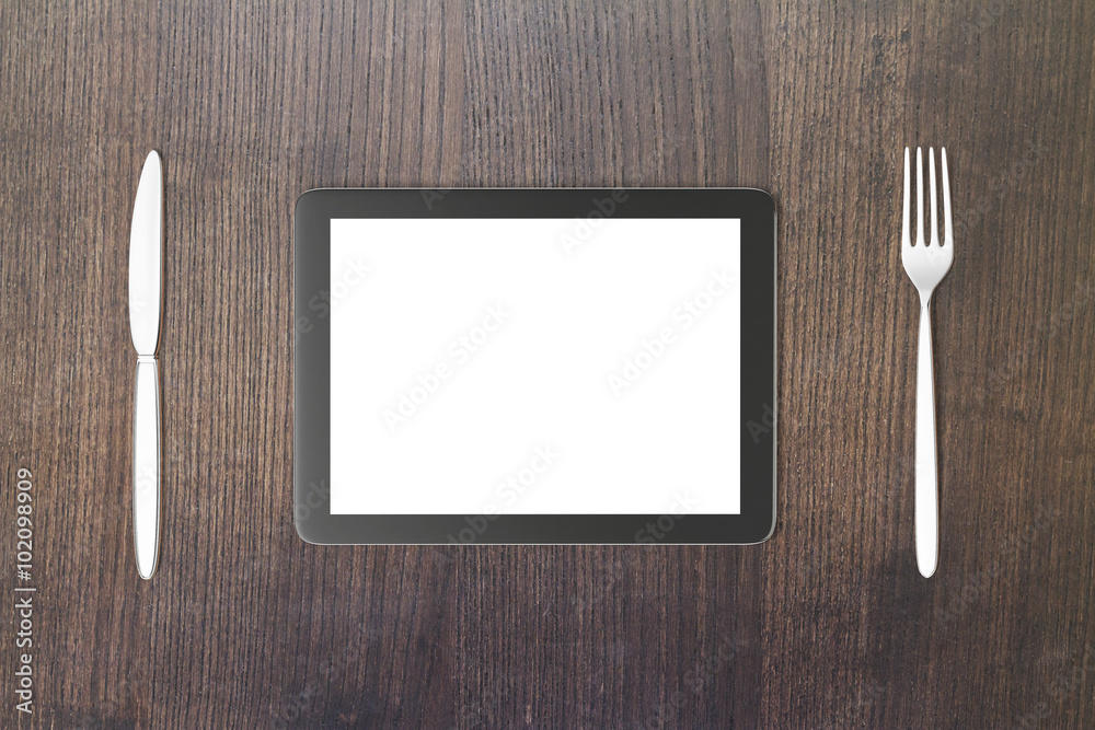 Poster Gadget concept with blank digital tablet screen with fork and kn