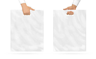 Blank plastic bag mock up holding in hand.
