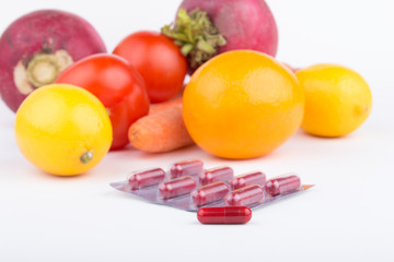 medicine pills,fruits and vegetables