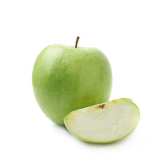 Green apple next to a slice isolated