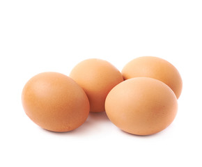 Four brown eggs composition isolated