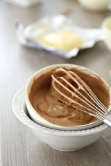 Cooking chocolate cream on kitchen