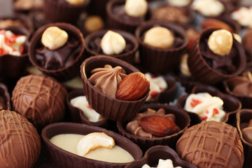 Delicious chocolate candies background, close up