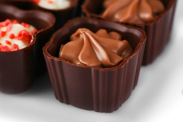 Assorted chocolate candies, close up