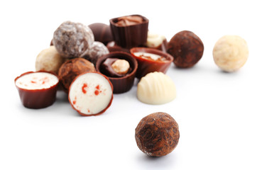 Assorted collection of chocolate candies and sweets, isolated on white