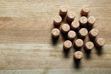 Wine corks on wooden background