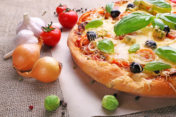 Delicious fresh pizza closeup