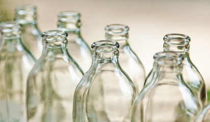 Clear glass bottles in the sun