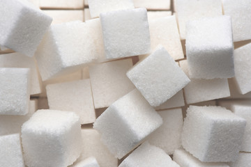 close up of white sugar cubes