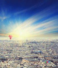 Aerial view of Paris cityscape with Pompidou at sunset with red balloon in form of heart. Business, Love and travel concept
