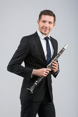 Young man playing the clarinet