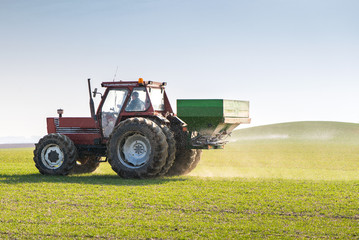 Naklejka premium Tractor and fertilizer