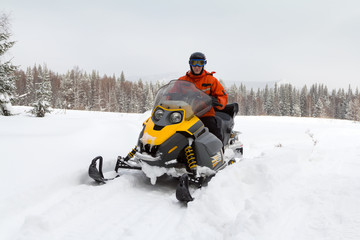 Athlete on a snowmobile