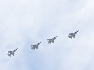 Fototapeta na wymiar Four MiG-31 flying formation on Victory Day