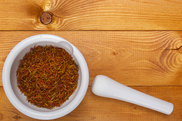 Culinary mortar with spice saffron