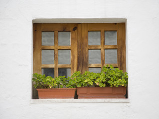 Wooden window in Alberobello, Italy