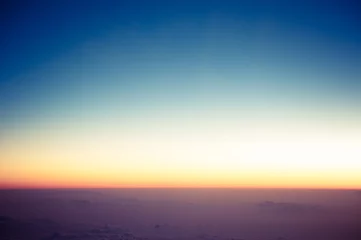 Fotobehang 飛行機から見た朝焼け,雲海, © beeboys