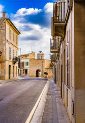 Mediterranean old town with historical town gate at background 