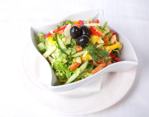 Fresh vegetable salad with olives.