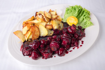 Marinated mushrooms and roasted potatoes.