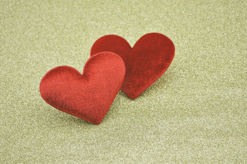 Fabric red heart shape on gold background, Love concept