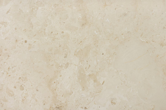 Cream marble background with natural pattern, texture.