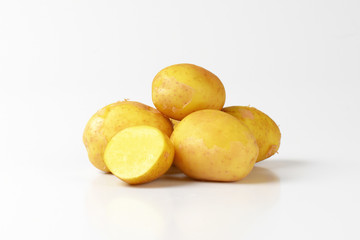 raw unpeeled potatoes