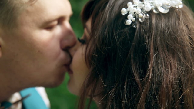 Man and woman, young happy married couple kissing. HD.