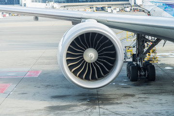 Jet engine of Air plane with runway background