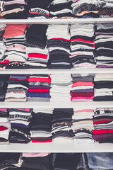 Dressing White Closet with Clothes Arranged Neatly Thickly Order