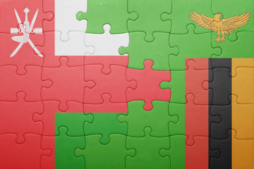 puzzle with the national flag of zambia and oman