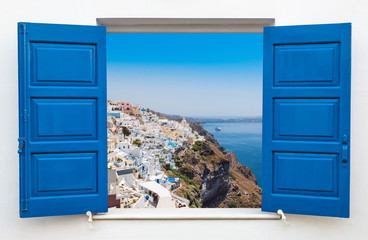 Window with view over the village of Oia at the Island Santorini