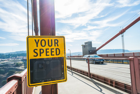 Your speed sign on the bridge with Lens burst flare