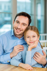 Fototapeta na wymiar Young father realizing happiness to be a parent.