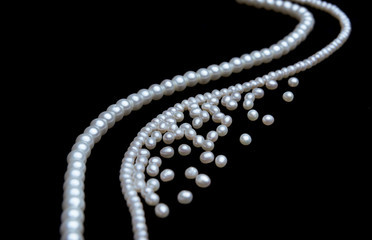 beautiful pearls on black background