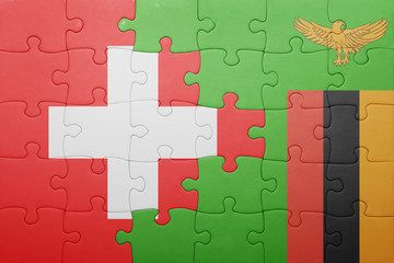 puzzle with the national flag of zambia and switzerland