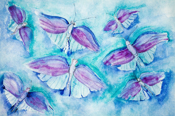 Flying butterflies on a turquoise background. The dabbing technique gives a soft focus effect due to the altered surface roughness of the paper.
